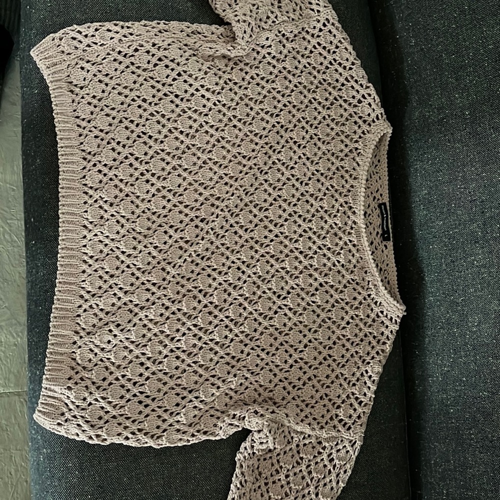 i am selling a over sweater -Never Worn-
